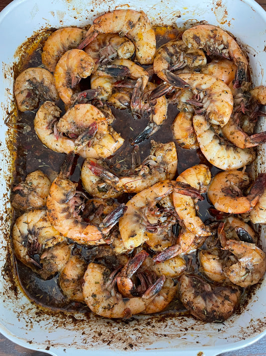 shrimp in a baking dish, cooked shrimp, smoke city foods BBQ Shrimp